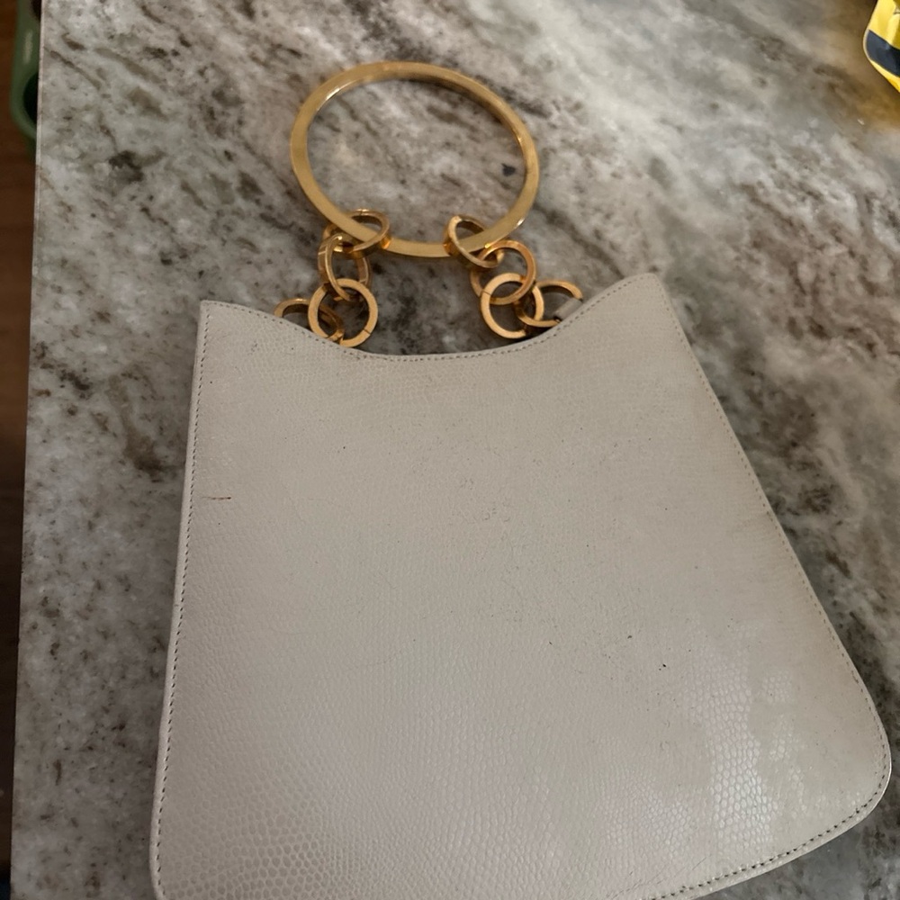 Chic Ivory Leather Handbag with Gold Ring Handles